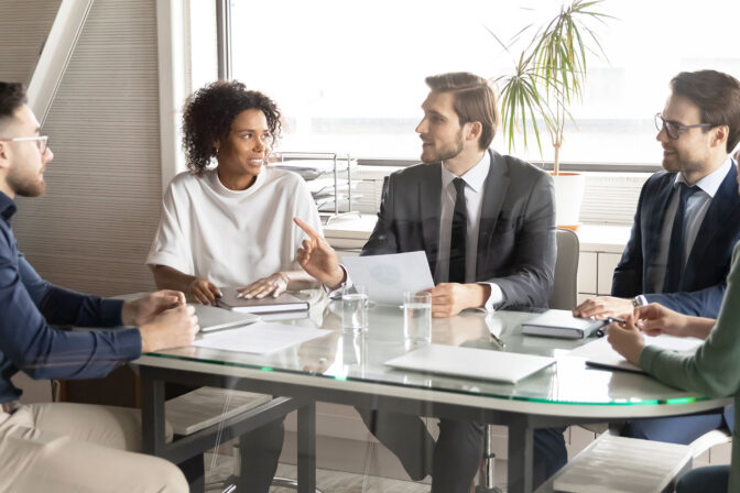 Employees meeting at conference table