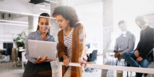 Two Women Looking at Laptop