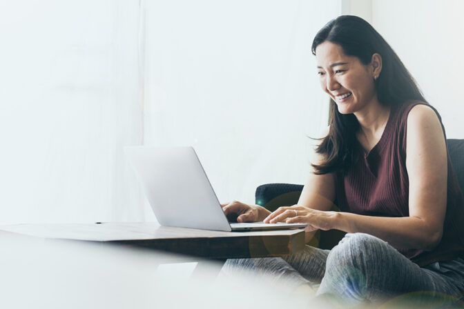 Woman Working on Laptop