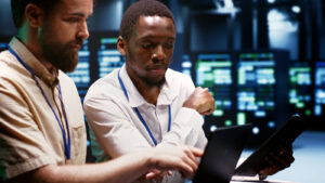 Coworkers overseeing supercomputers