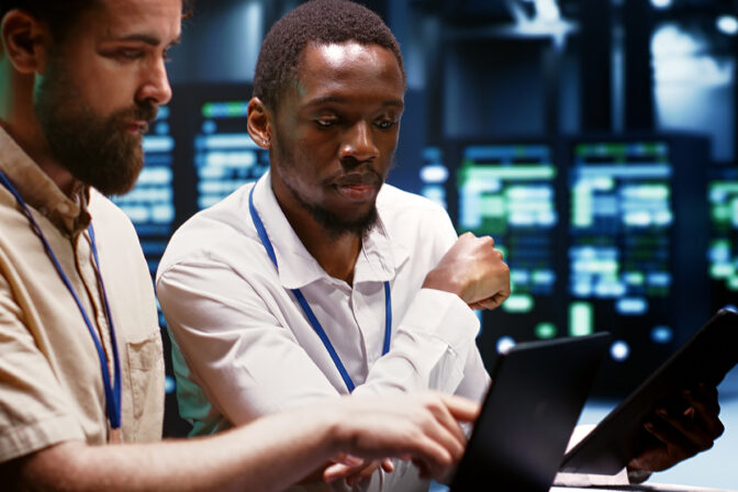 Coworkers overseeing supercomputers