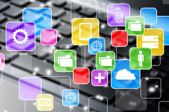 An abstract conceptual image of SaaS operations management featuring a variety of colorful app icons floating above a blurred computer keyboard. Icons include gears for settings, speech bubbles for communication, folders for file management, a globe for connectivity, a mobile device, a person for user management, clouds for cloud computing, and a medical cross for health services, all interconnected with thin lines, representing the integrated nature of software as a service platforms.