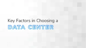 The text "Key Factors in Choosing a Data Center" overlaid on a white and grey textured background.