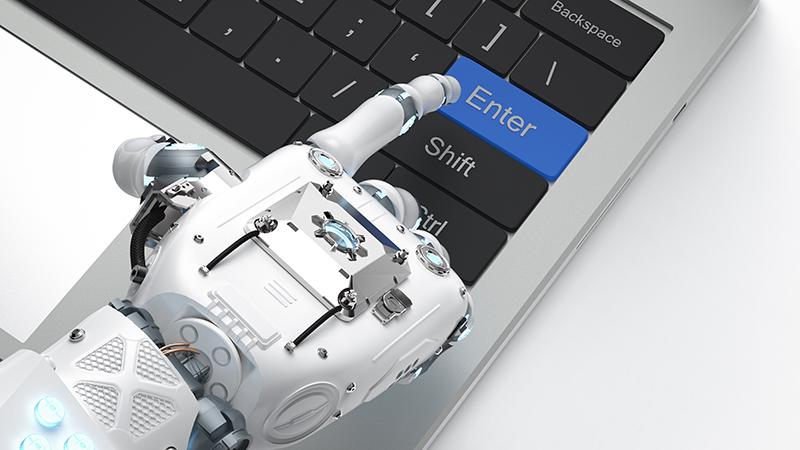 A robotic hand hovering over the "Enter" key on a laptop keyboard.