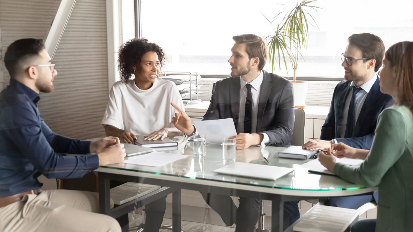 Employees meeting at conference table